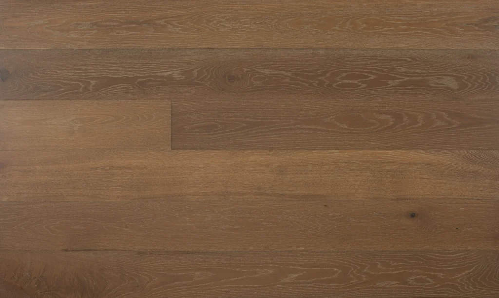 Close-up of wire-brushed brown European oak engineered planks from Aged Wide Floors showing grain and plank seams