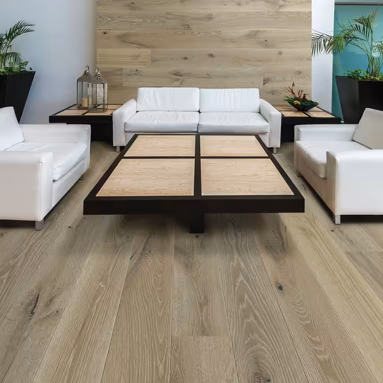 Hallmark Floors manufacturer image of Alta Vista Balboa Oak wood flooring in a lobby with white sofas and a low wood table